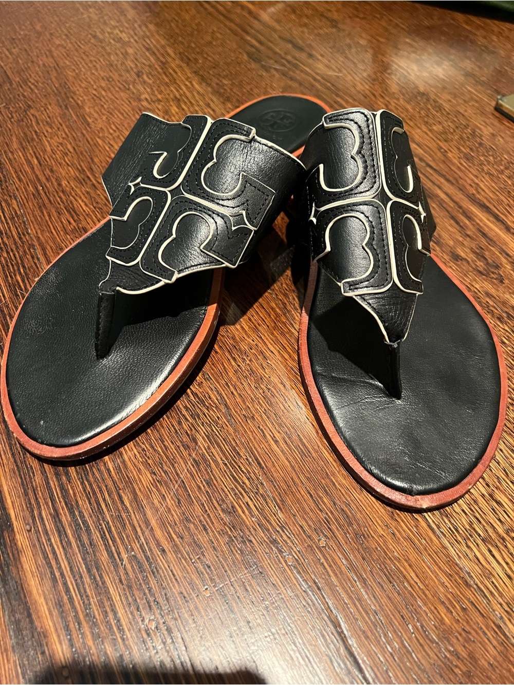 Tory Burch Black Leather Logo Thong Sandals with white detail. - Picture 2 of 4